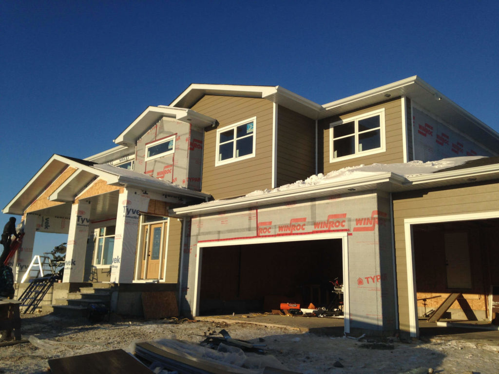 New Winnipeg home with new siding, fascia, eavestrough.